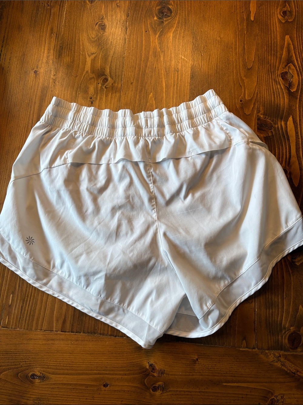 White athleta mesh racer run short 4”